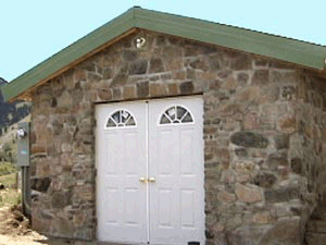 Slipform Stone Masonry shed workshop.